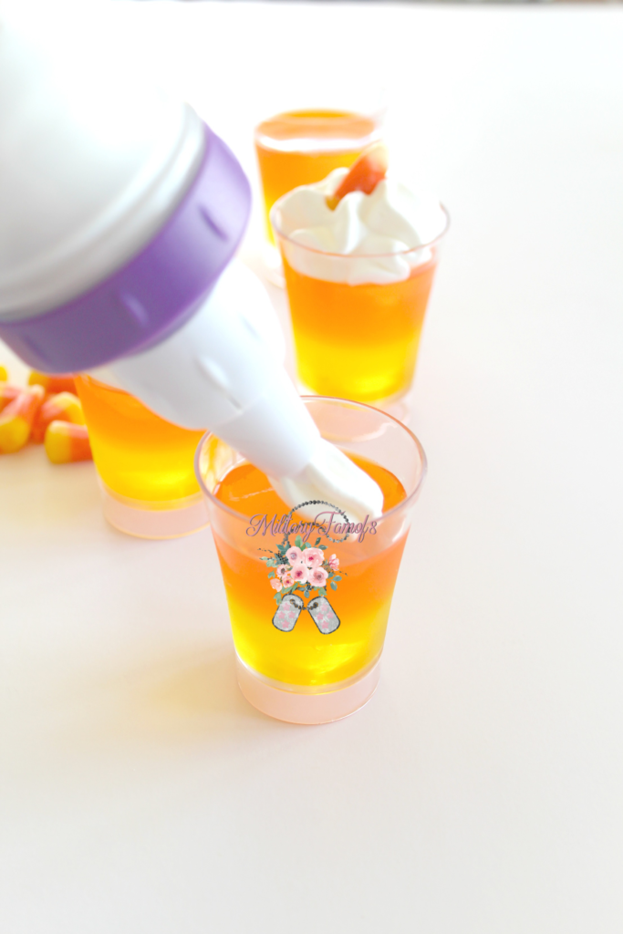 Candy Corn Jell-O Shots The Perfect Halloween Treat! Get into the spirit of things with these candy corn jello shots! They are perfect for kids to enjoy and you can also add a little fun adult potion to make them the perfect adult Halloween treat!