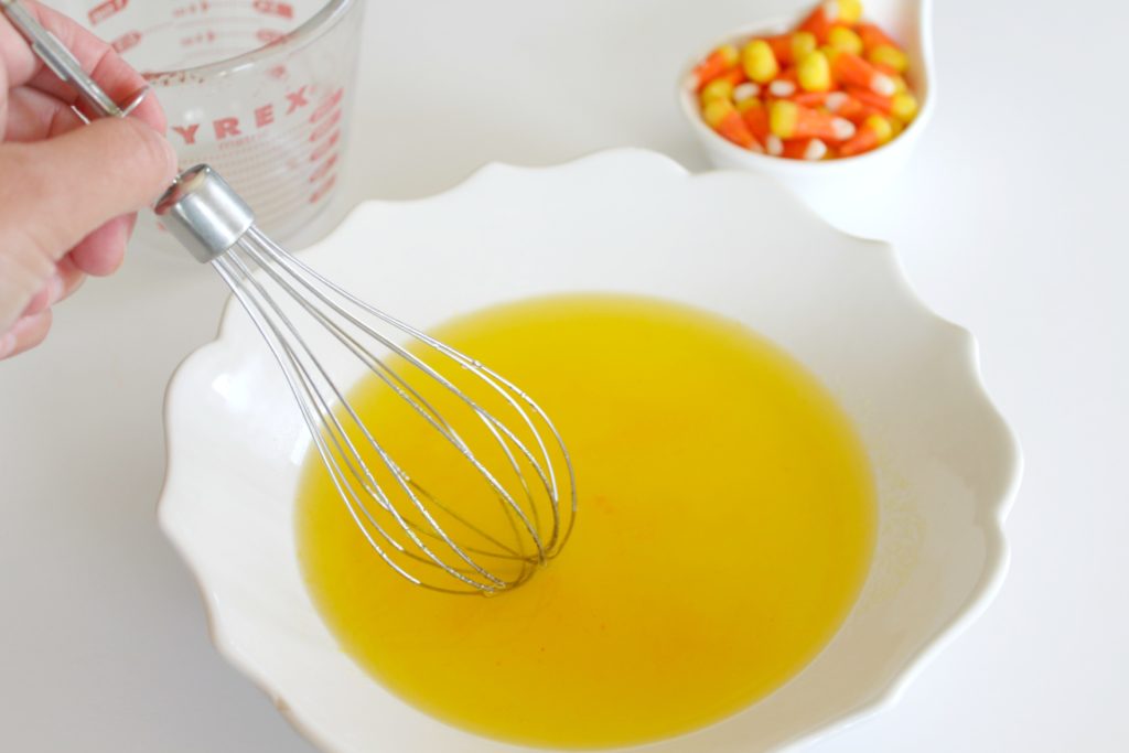 Candy Corn Jell-O Shots The Perfect Halloween Treat! Get into the spirit of things with these candy corn jello shots! They are perfect for kids to enjoy and you can also add a little fun adult potion to make them the perfect adult Halloween treat!