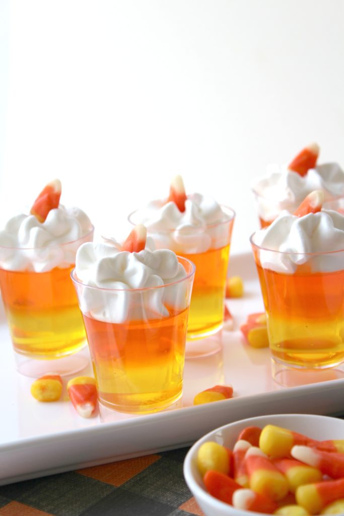 Candy Corn Jell-O Shots The Perfect Halloween Treat! Get into the spirit of things with these candy corn jello shots! They are perfect for kids to enjoy and you can also add a little fun adult potion to make them the perfect adult Halloween treat!