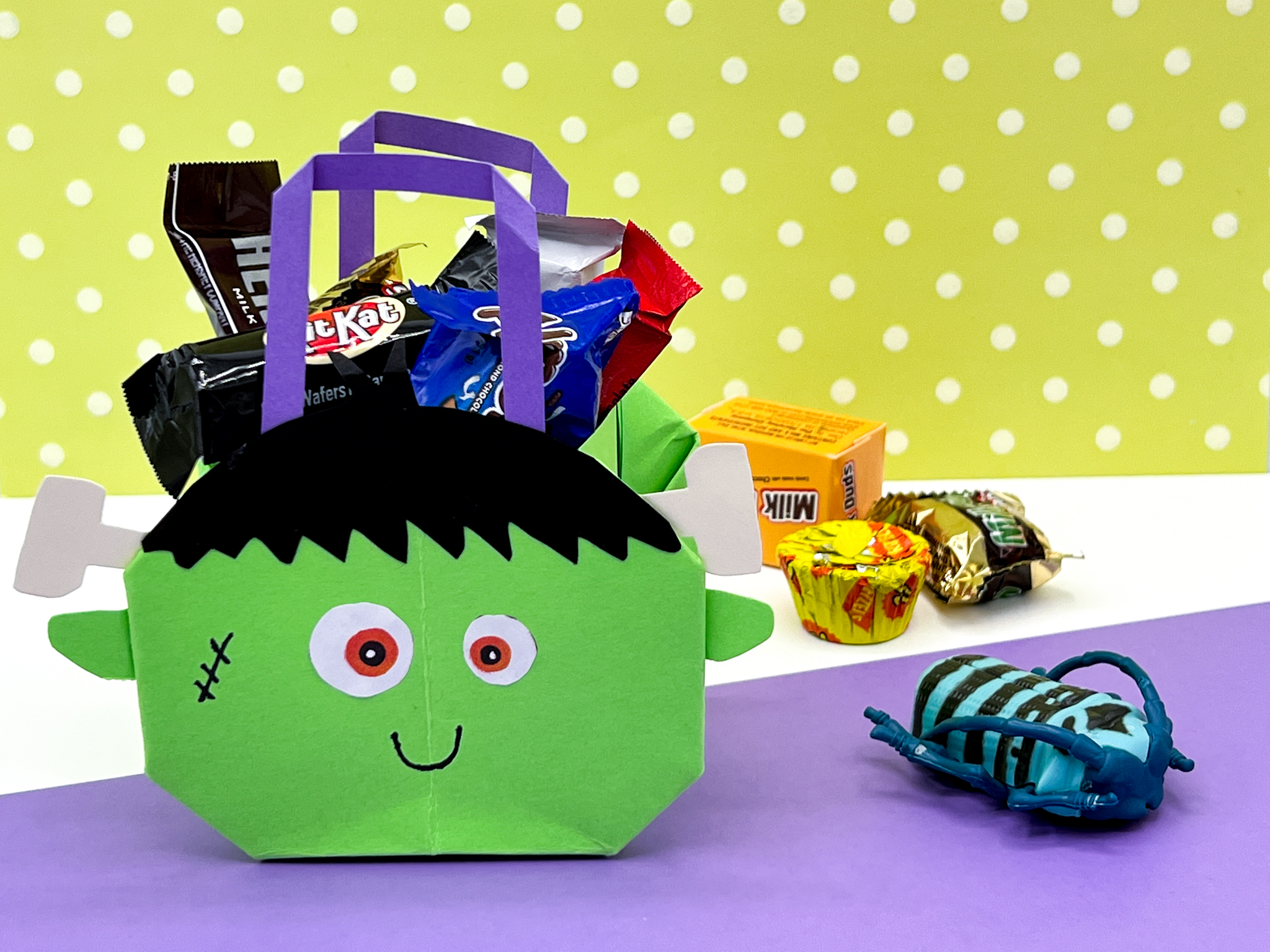 Halloween Origami Craft - Frankenstein Treat Bag Follow this easy photo & video tutorial for a Halloween Origami Craft - Frankenstein Treat Bag. This DIY is great to do with kids OR adults! FREE PDF printable template and instructions & Video!